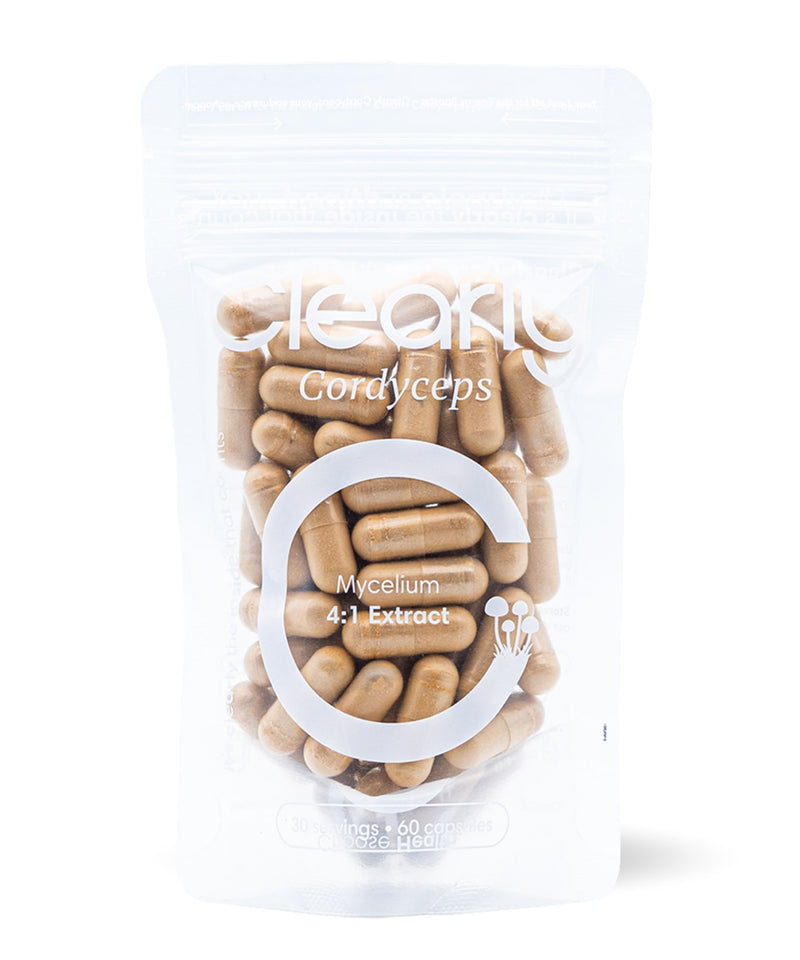 Clearly Cordyceps capsules in a bottle, showing the supplement packaging and capsules inside.