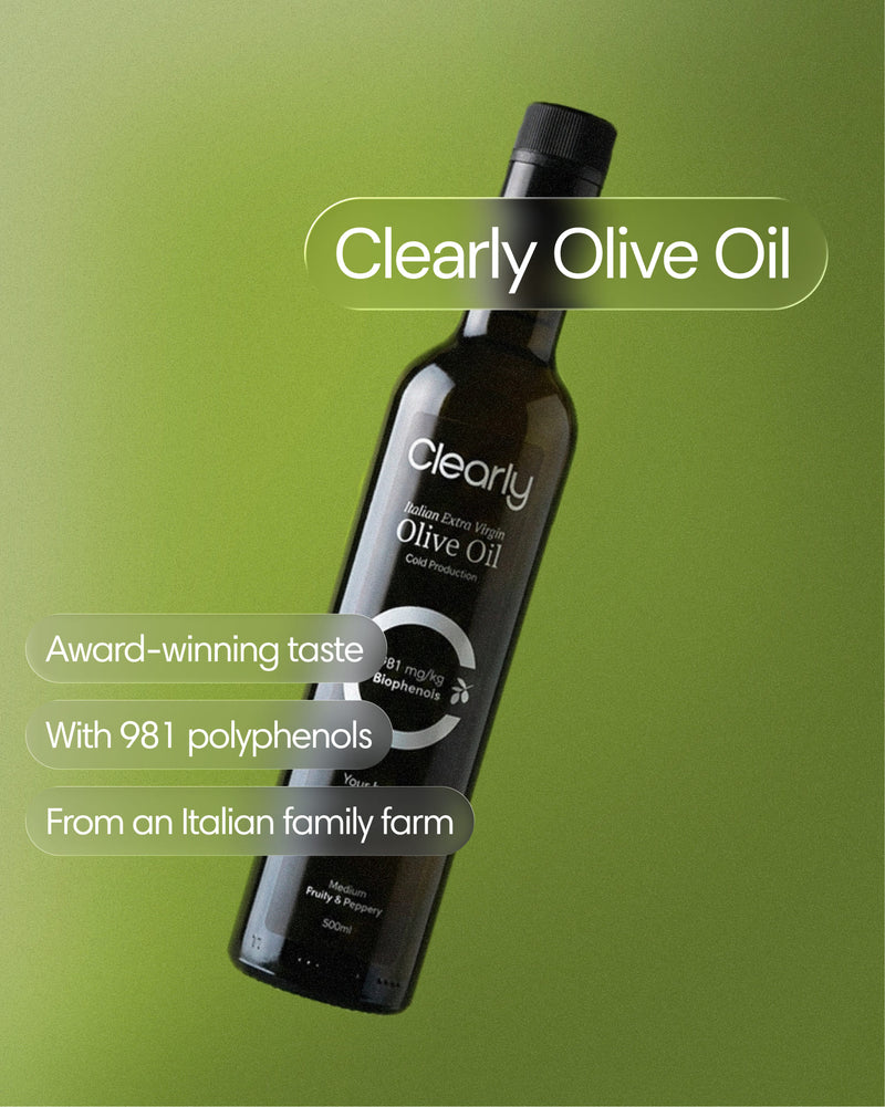 Clearly Extra Virgin Olive Oil bottle with dark glass and gold cap, shown from the front on a white background.