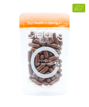 Organic Chaga capsules by Clearly, showing the supplement bottle with capsules inside, emphasizing natural health benefits.